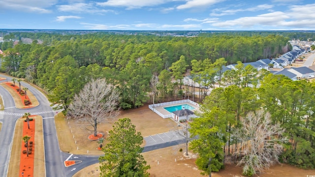 drone / aerial view with a view of trees