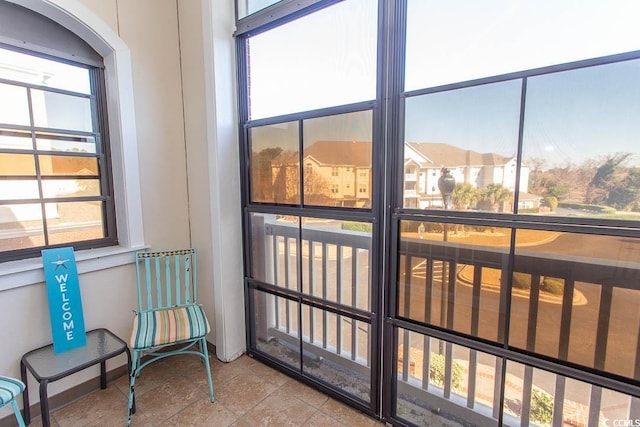 sunroom featuring plenty of natural light