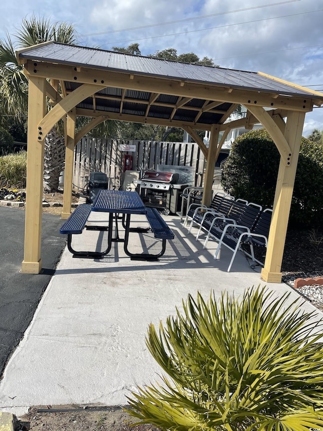 view of community featuring a gazebo and a patio