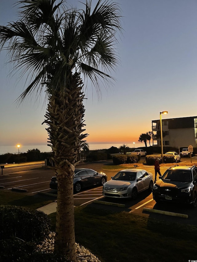 parking at dusk with uncovered parking