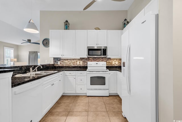 kitchen with white appliances, light tile patterned floors, ceiling fan, decorative light fixtures, and white cabinetry