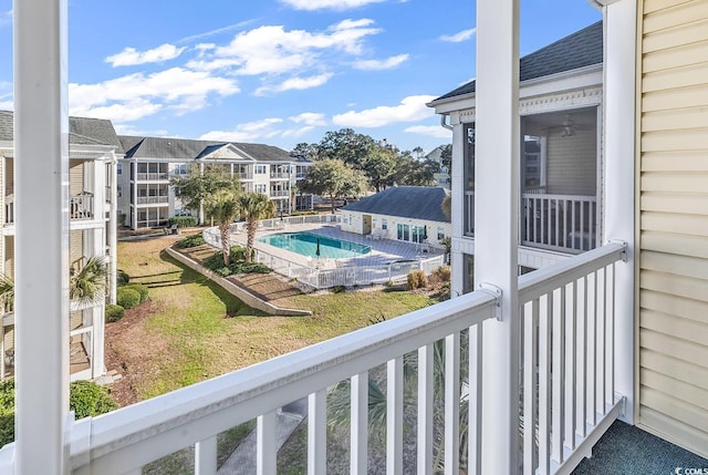 community pool with a lawn