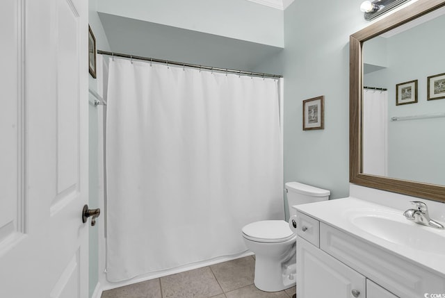 full bathroom with toilet, tile patterned flooring, and vanity