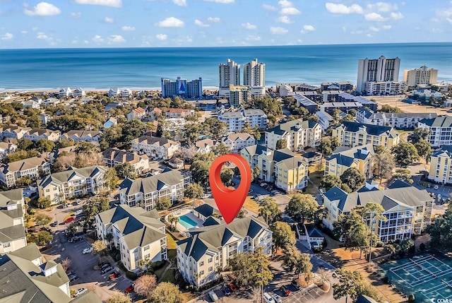 drone / aerial view with a view of city and a water view