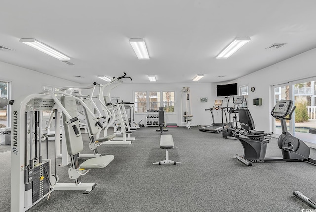 exercise room featuring visible vents