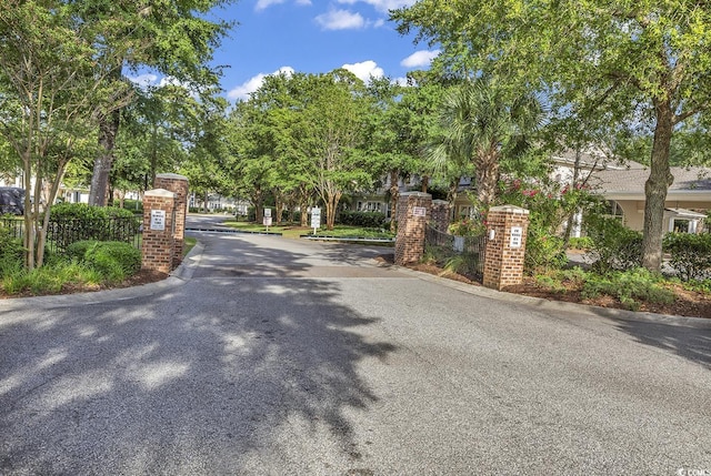 view of street featuring a gated entry