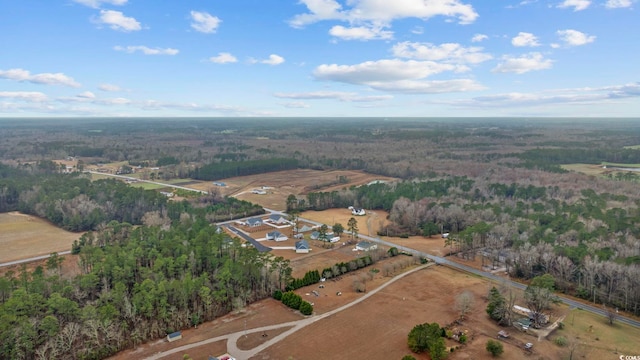 birds eye view of property with a rural view