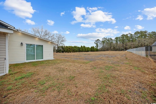 view of yard featuring fence