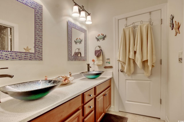 bathroom featuring double vanity and a sink