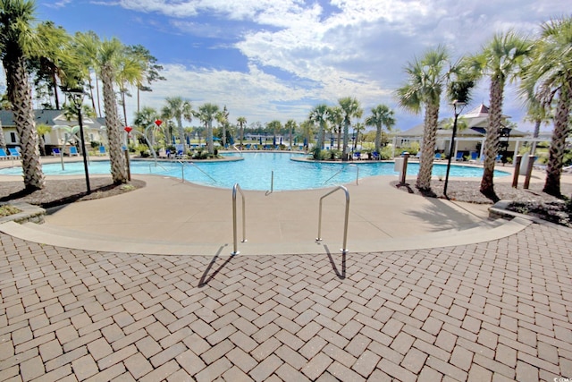 pool with a patio area