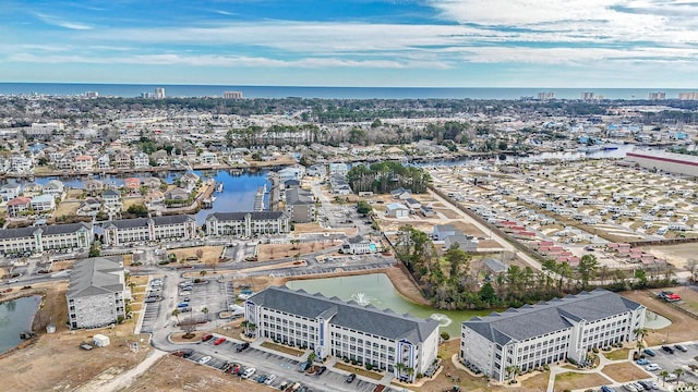 bird's eye view with a water view and a city view