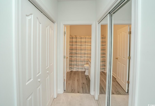 hallway with light wood-style flooring