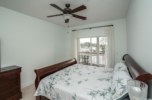 bedroom featuring light carpet, ceiling fan, baseboards, and access to exterior