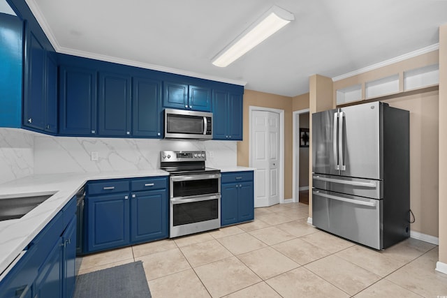 kitchen featuring blue cabinetry, tasteful backsplash, light tile patterned floors, and stainless steel appliances