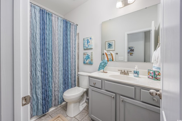 full bath featuring toilet, a shower with shower curtain, tile patterned flooring, and vanity