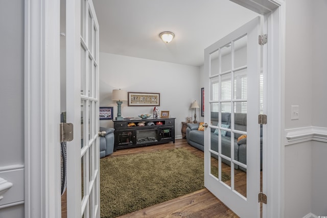 office space featuring french doors and wood finished floors