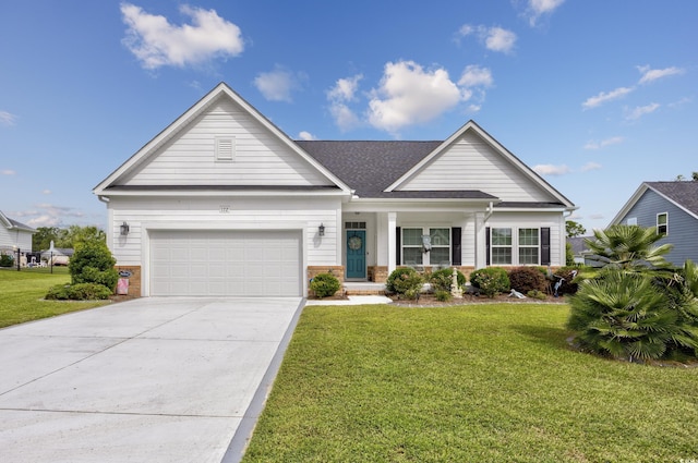 view of front of home with concrete driveway, a front lawn, an attached garage, and brick siding