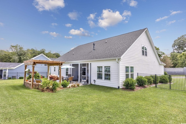 rear view of house featuring roof with shingles, a patio area, a lawn, and fence