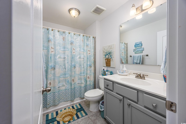 full bath with visible vents, toilet, shower / bath combo with shower curtain, vanity, and tile patterned flooring