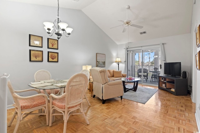 living room with high vaulted ceiling, visible vents, and ceiling fan with notable chandelier