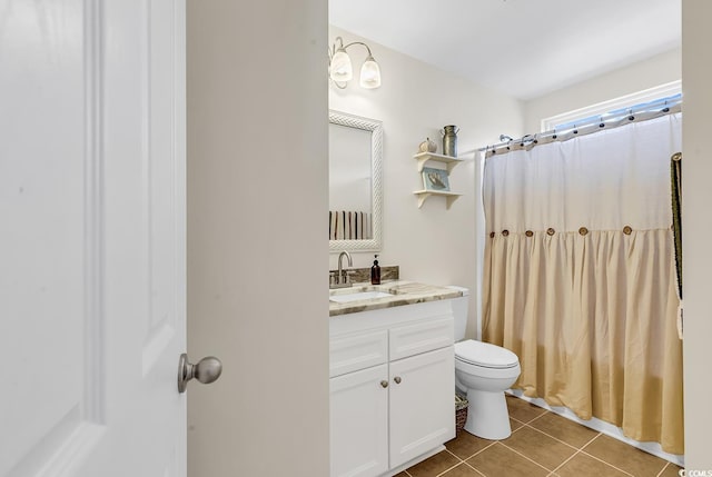 full bath featuring curtained shower, vanity, toilet, and tile patterned floors