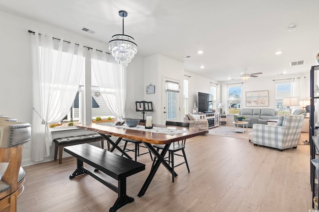 2476 Blue Crane Cir Unit 101, Myrtle Beach, SC 29577 - dining room with recessed lighting, light wood-type flooring, visible vents, and ceiling fan with notable chandelier