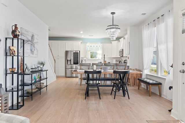 2476 Blue Crane Cir Unit 101, Myrtle Beach, SC 29577 - dining room with plenty of natural light, visible vents, and light wood-style flooring