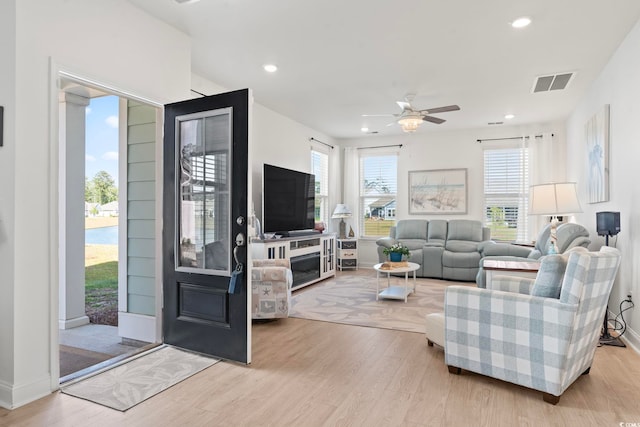 2476 Blue Crane Cir Unit 101, Myrtle Beach, SC 29577 - living room featuring recessed lighting, wood finished floors, visible vents, a ceiling fan, and baseboards