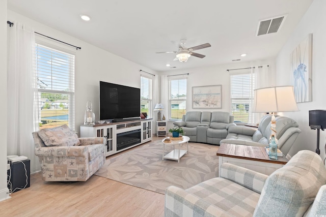2476 Blue Crane Cir Unit 101, Myrtle Beach, SC 29577 - living area with recessed lighting, wood finished floors, visible vents, and ceiling fan
