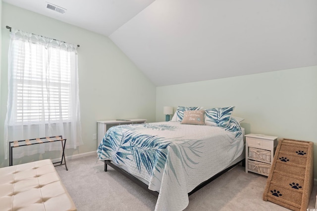 2476 Blue Crane Cir Unit 101, Myrtle Beach, SC 29577 - bedroom featuring lofted ceiling, visible vents, and light carpet