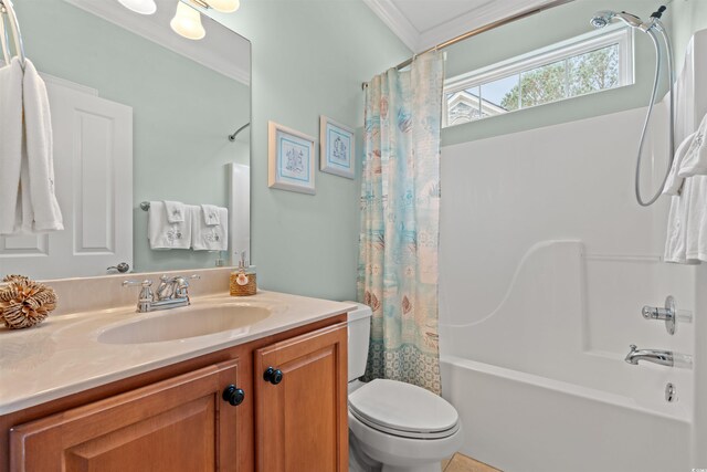 full bath with vanity, ornamental molding, shower / bath combo with shower curtain, and toilet