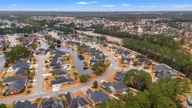 aerial view featuring a water view and a residential view