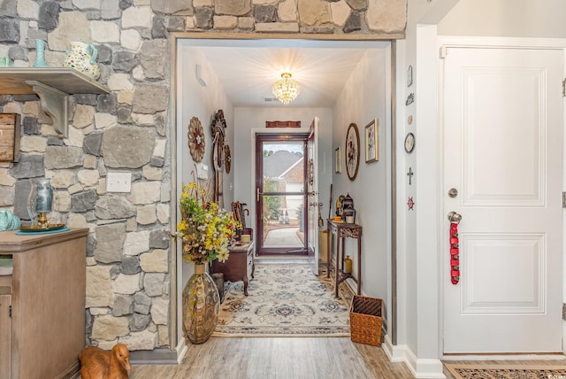 entrance foyer featuring wood finished floors