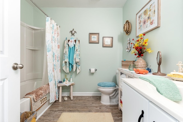 bathroom featuring shower / tub combo, baseboards, toilet, and wood finished floors