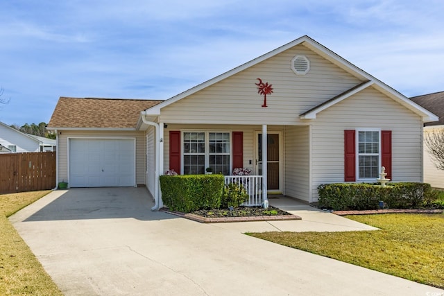 ranch-style home with a porch, a garage, a shingled roof, concrete driveway, and a front yard