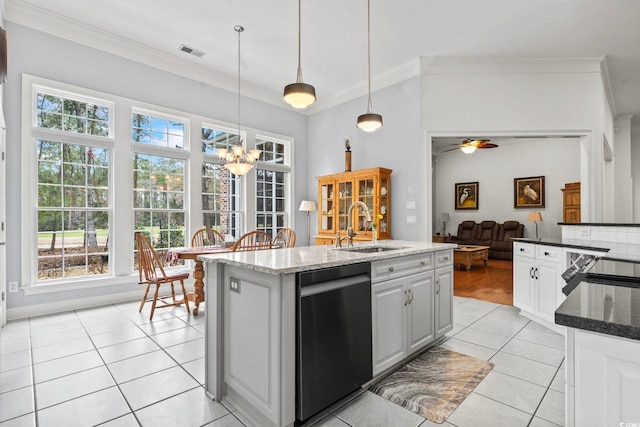 kitchen with dishwashing machine, light tile patterned flooring, a sink, visible vents, and crown molding