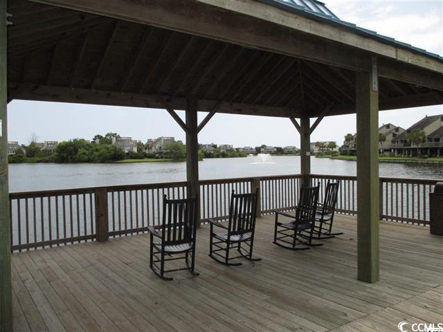 dock area with a water view and a gazebo