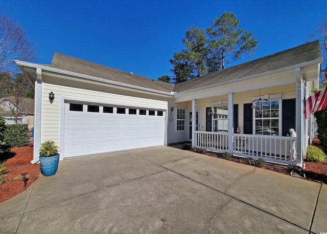 single story home featuring a garage, a shingled roof, a porch, and concrete driveway