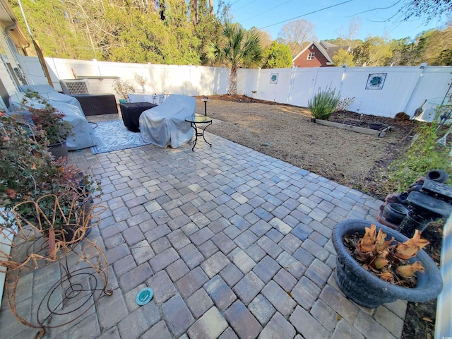 view of patio with a fenced backyard