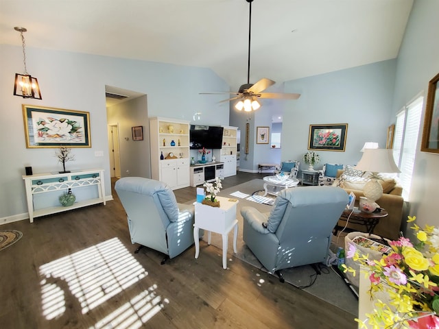 living area with ceiling fan, baseboards, vaulted ceiling, and dark wood-style flooring