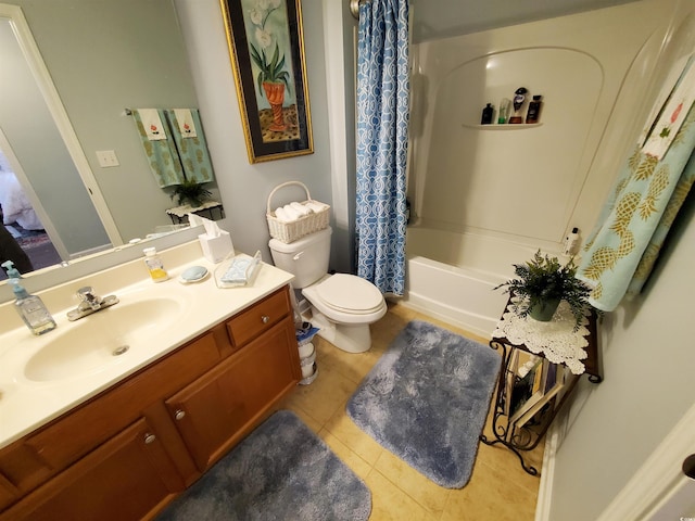 bathroom featuring shower / bath combination with curtain, tile patterned flooring, vanity, and toilet