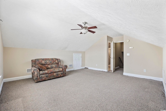 197 Black Bear Rd, Myrtle Beach, SC 29588 - unfurnished room with lofted ceiling, ceiling fan, carpet floors, an upstairs landing, and a textured ceiling