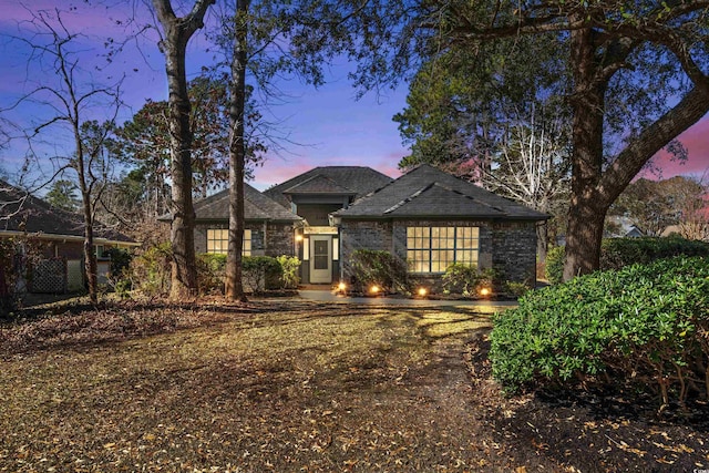 view of front of home featuring brick siding