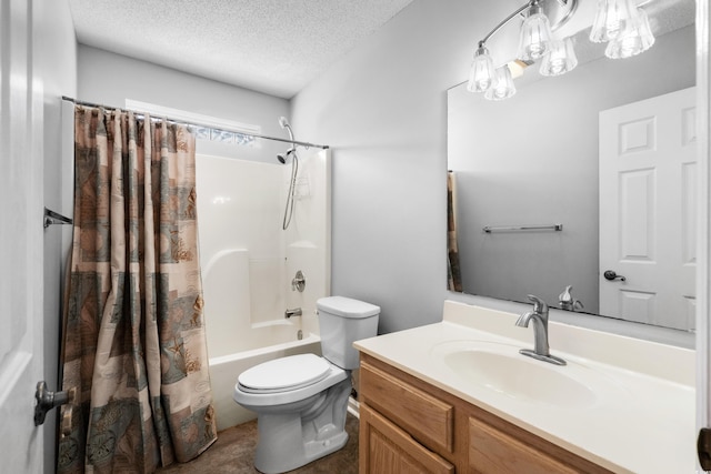 bathroom featuring vanity, a textured ceiling, toilet, and shower / bath combo with shower curtain