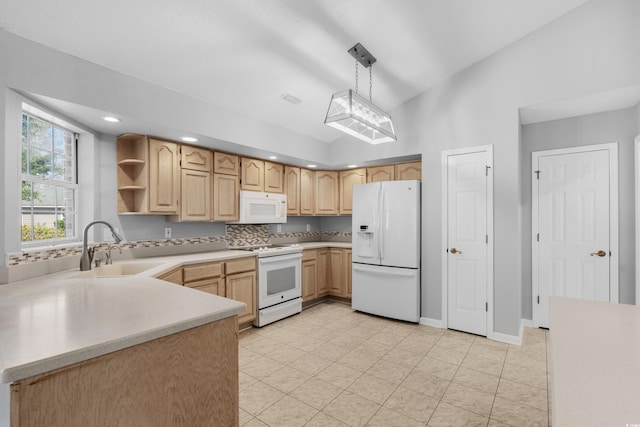 kitchen featuring white appliances, a sink, light countertops, open shelves, and pendant lighting