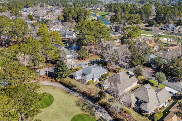 bird's eye view featuring golf course view and a residential view