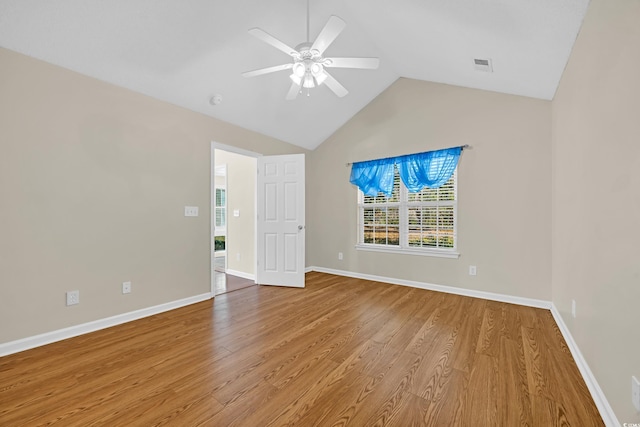 interior space featuring light wood-style floors, baseboards, and visible vents