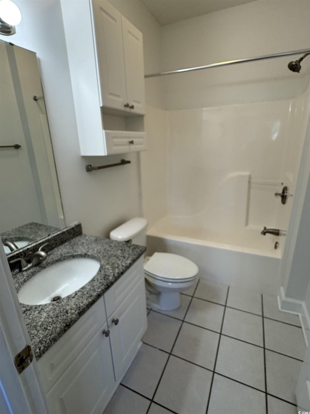 full bathroom with tile patterned floors, vanity, toilet, and shower / bathtub combination