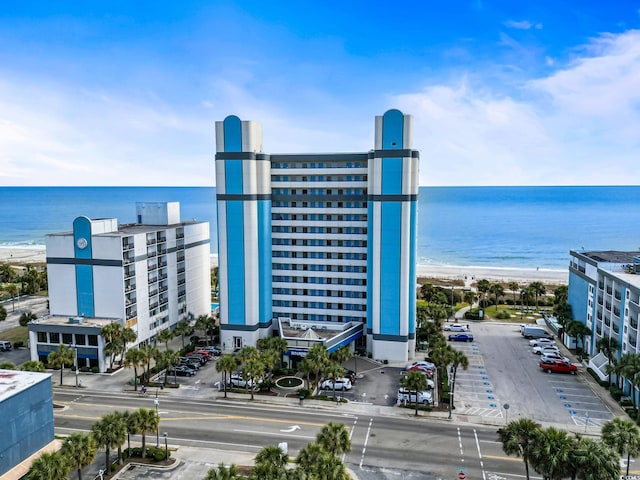 bird's eye view featuring a beach view and a water view