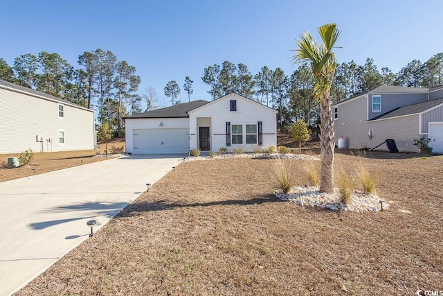 view of front of house with an attached garage and driveway